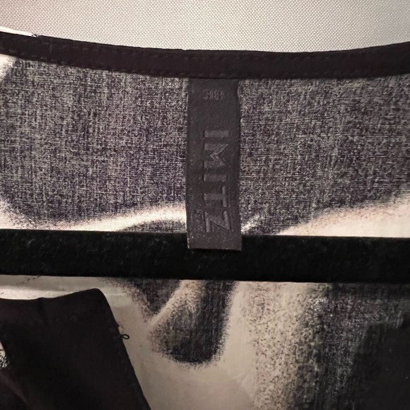 Dressy black and white top. - Picture 3 of 3